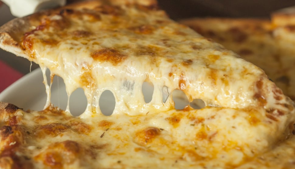 slice_of_hot_cheese_pizza_lifted_off_of_pan